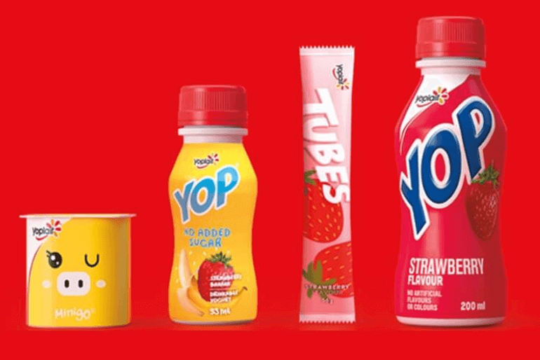 Family shot of four Yoplait products